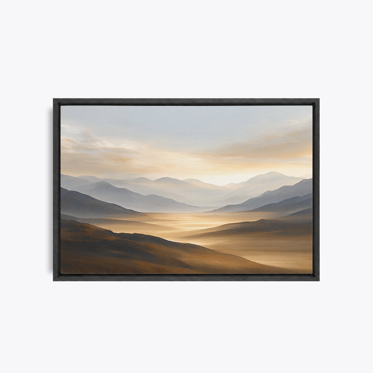 Tableau décoratif montagnes gris perle et vallée dorée en cadre noir, vu de face, ciel clair au lever du jour